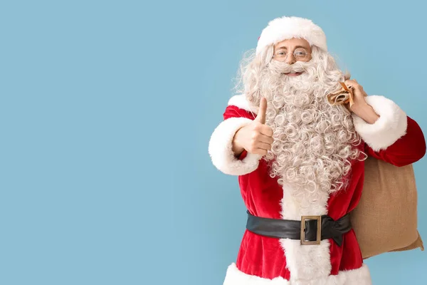 Santa Claus Sack Bag Showing Thumb Blue Background — Stock Photo, Image