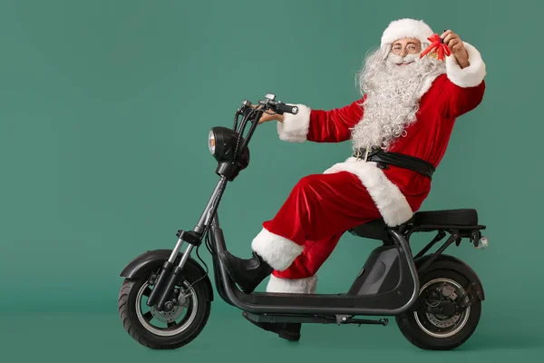 Papai Noel Com Sino Natal Bicicleta Elétrica Fundo Verde — Fotografia de Stock