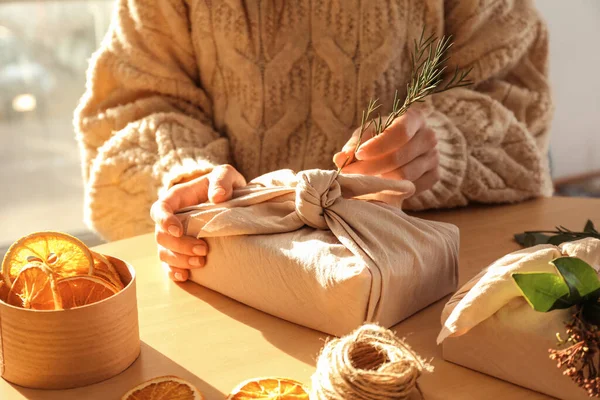 Woman Decorating Gift Box Wrapped Fabric Plant Branch Table Closeup — Stock Photo, Image