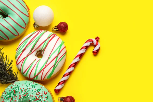 Tasty Christmas Donuts Fir Tree Branch Balls Candy Cane Yellow — Stock Photo, Image