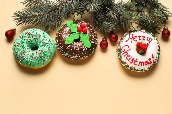Tasty Christmas Donuts Fir Tree Branches Balls Beige Background — Stock Photo, Image