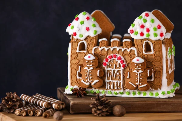 Wooden Board Beautiful Gingerbread House Blue Background — Stock Photo, Image