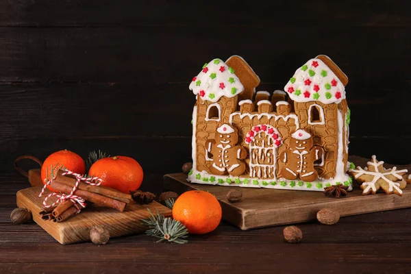 Beautiful Gingerbread House Tangerines Black Wooden Background — Stock Photo, Image