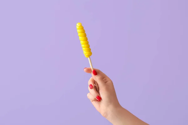 Woman Holding Sweet Yellow Lollipop Lilac Background — Stock Photo, Image