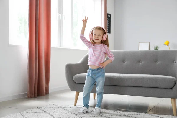 Cute Little Girl Pink Headphones Dancing Home — Stock Photo, Image