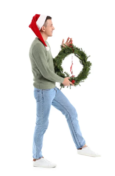 Junger Mann Mit Weihnachtskranz Auf Weißem Hintergrund — Stockfoto