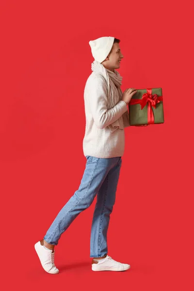 Going Young Man Christmas Gift Color Background — Stock Photo, Image