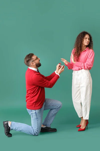 Young African American Woman Rejecting Marriage Proposal Color Background — Stock Photo, Image