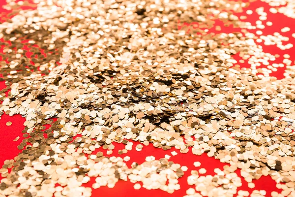 Heap Golden Confetti Red Background — Stock Photo, Image