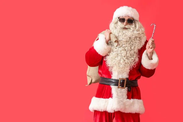 Papai Noel Óculos Sol Com Cana Açúcar Saco Saco Fundo — Fotografia de Stock