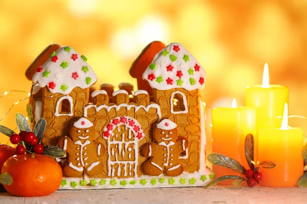 Gingerbread House Tangerine Burning Candles Table Blurred Background — Stock Photo, Image