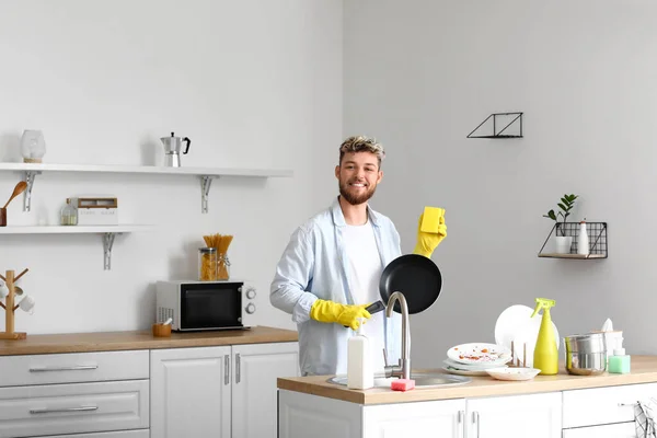 Handsome Young Man Sponge Frying Pan Kitchen — Stock Photo, Image