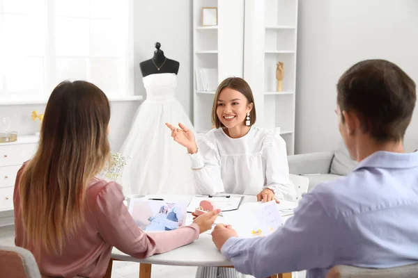 Female Wedding Planner Discussing Ceremony Clients Office — 图库照片