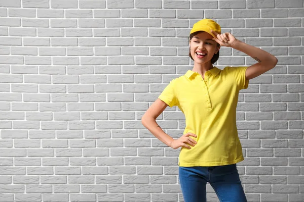 Beautiful Young Woman Stylish Polo Shirt Brick Background — Stock Photo, Image