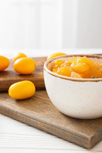 Bowl Tasty Kumquat Jam Fresh Fruits Kitchen Table — Stock Photo, Image