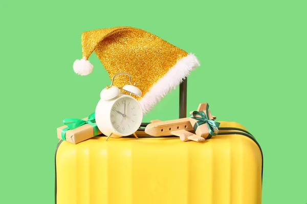 Yellow Suitcase Christmas Gift Boxes Alarm Clock Wooden Airplane Santa — Stock Photo, Image