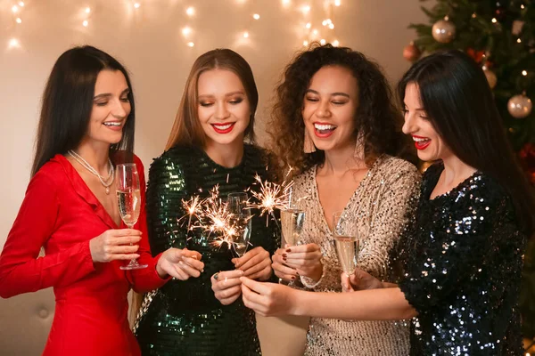 Beautiful Young Women Sparklers Glasses Champagne Celebrating Christmas Home — Stockfoto