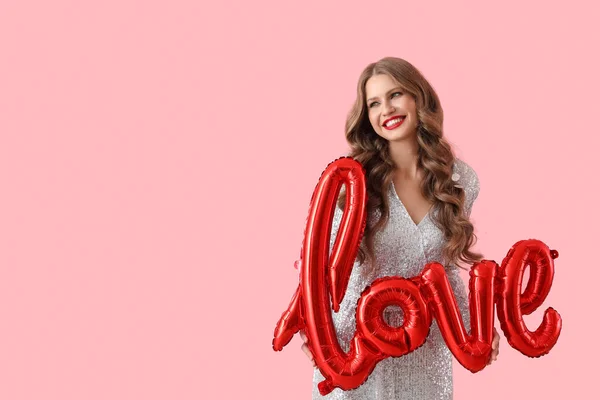 Beautiful Happy Young Woman Balloon Shape Word Love Pink Background — 图库照片