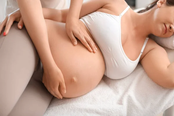 Pregnant Woman Getting Massage Therapist Spa Salon Closeup — Stockfoto