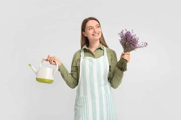 Female Gardener Lavender Watering Can Light Background — Stock Photo, Image