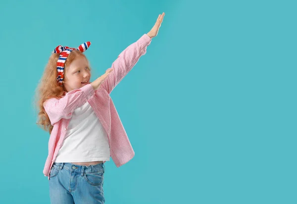 Little Redhead Girl Striped Shirt Dancing Blue Background — Stockfoto