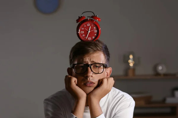 Tired Young Man Red Alarm Clock Office Night — Stock Photo, Image