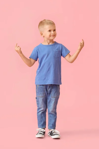 Adorable Little Boy Blue Shirt Pointing Something Pink Background — Stockfoto