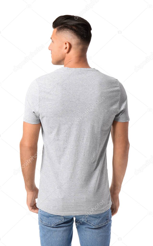Handsome young man in stylish t-shirt isolated on white, back view