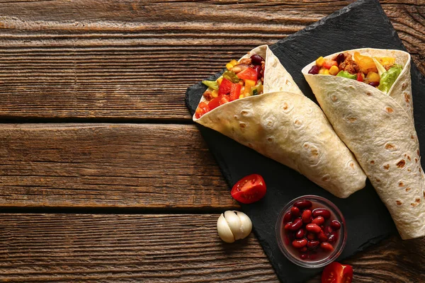 Board Tasty Mexican Burritos Vegetables Wooden Background — Stock Photo, Image