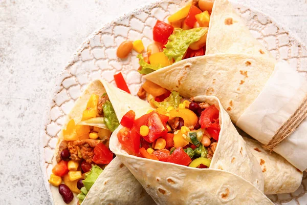 Plate Tasty Mexican Burritos Vegetables Light Background Closeup — Stock Photo, Image