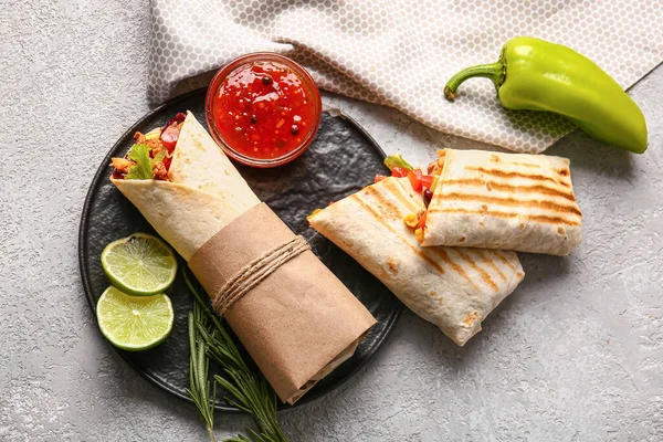 Plate Tasty Mexican Burritos Vegetables Sauce Grey Background — Stock Photo, Image