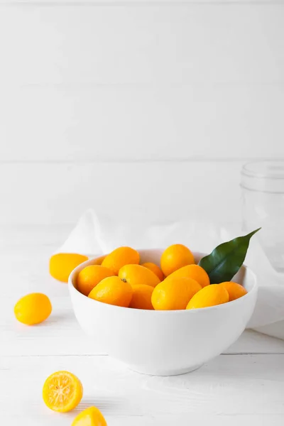 Bowl Tasty Kumquat Fruits Light Background — Stock Photo, Image
