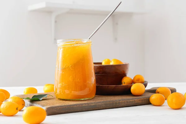 Jar Tasty Kumquat Jam Fresh Fruits Kitchen Table — Stock Photo, Image