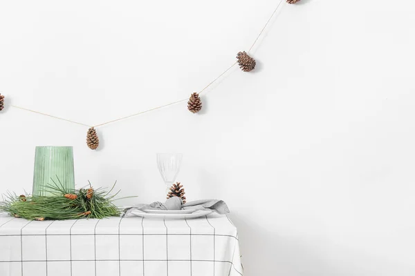 Beautiful Table Setting Pine Cones Fir Branches White Wall — Stock Photo, Image