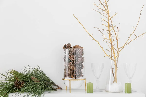 Beautiful Vase Pine Cones Fir Branch Candles Glasses Table White — Stock Photo, Image