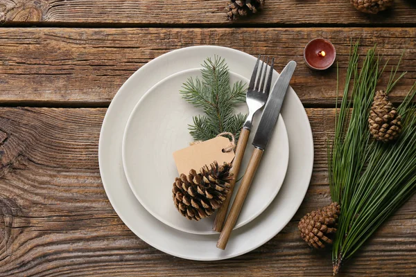 Beautiful Table Setting Pine Cones Fir Branches Wooden Background — Stockfoto