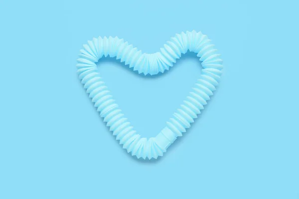 Corazón Pop Tube Sobre Fondo Azul — Foto de Stock