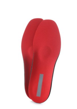 Beyaz arkaplanda kırmızı ortopedik tabanlar