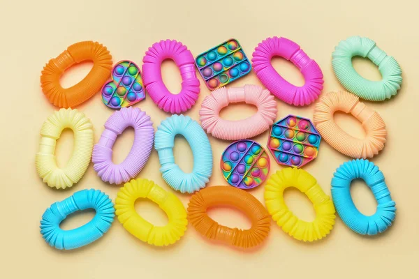 Coloridos Tubos Pop Juguetes Pop Fidget Sobre Fondo Amarillo —  Fotos de Stock