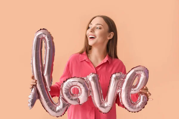 Young Woman Balloon Shape Word Love Color Background Valentine Day — Stock Photo, Image