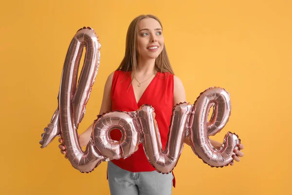 Young Woman Balloon Shape Word Love Color Background Valentine Day — Stock Photo, Image