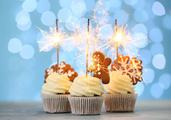 Tasty Christmas Cupcakes Gingerbread Cookies Sparklers Table Blurred Background — Foto Stock