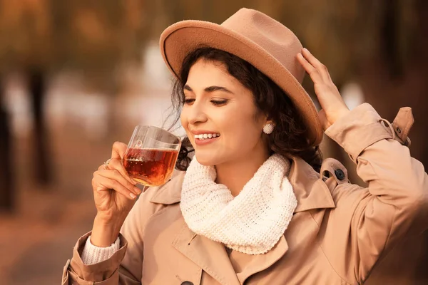 Beautiful Woman Drinking Tea Outdoors — Stock Photo, Image