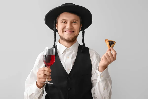 Young Jewish Man Tasty Hamantaschen Purim Holiday Glass Wine Grey — Stock Photo, Image
