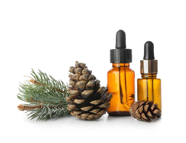 Bottles Essential Oil Pine Cones White Background — Stock Photo, Image