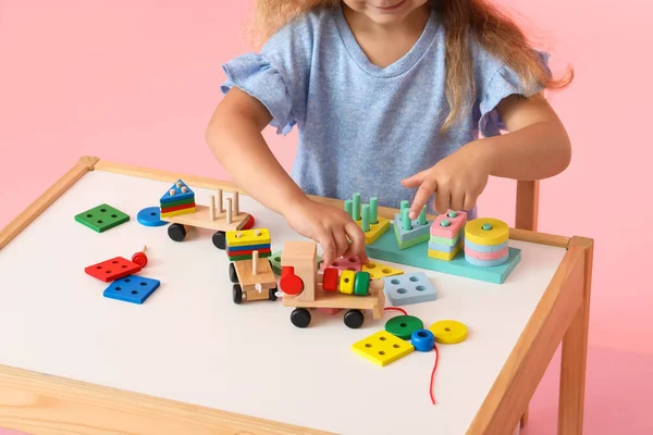 Cute Little Girl Playing Building Blocks Table Pink Background — Stock Photo, Image