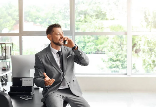Smiling Young Businessman Talking Mobile Phone Office — Foto de Stock