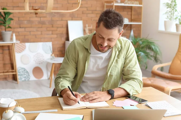Handsome Man Writing Notebook Home — Stock Photo, Image