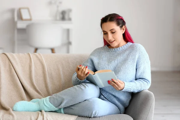 Beautiful Woman Blue Sweater Reading Book Sofa Home — Stock Photo, Image