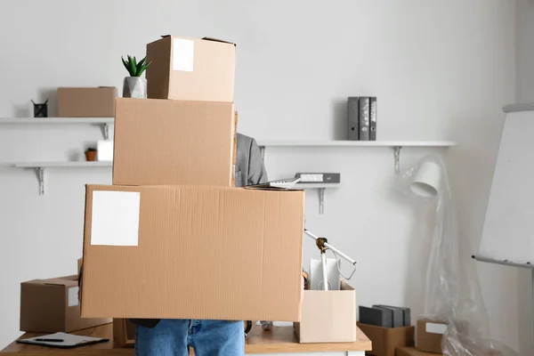 Man Holding Cardboard Boxes Belongings Office Moving Day — стоковое фото